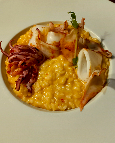 Risotto alla 'nduja con calamaro arrostito